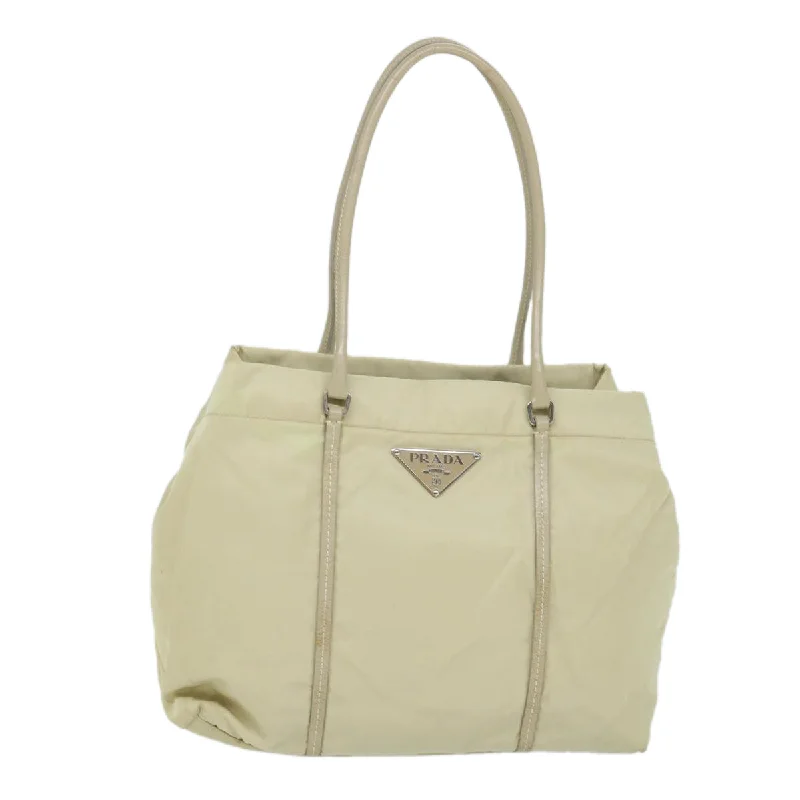 Prada bags with a zip - top closure and multiple interior pockets for organizationPRADA Tessuto Shoulder Bag