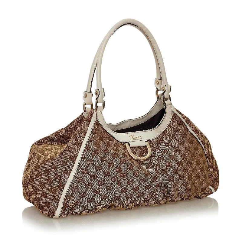 Women Gucci bags with interlocking G hardware for a classic lookGucci GG Canvas Abbey D-Ring Shoulder Bag (34093)