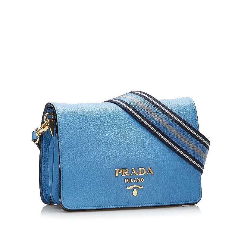 Prada Cleo bags with a contrast - colored interior for visual interestPrada Vitello Daino Flap Crossbody ANA2Jx