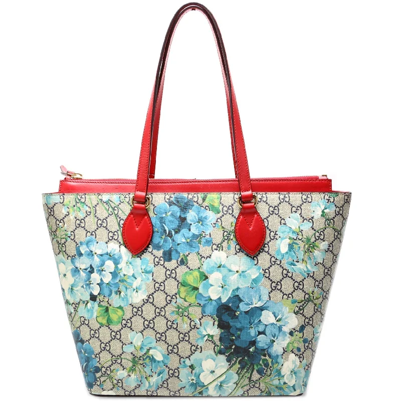 Ladies Gucci Dionysus bags in a pastel colorGucci Supree Blooms Tote 415721