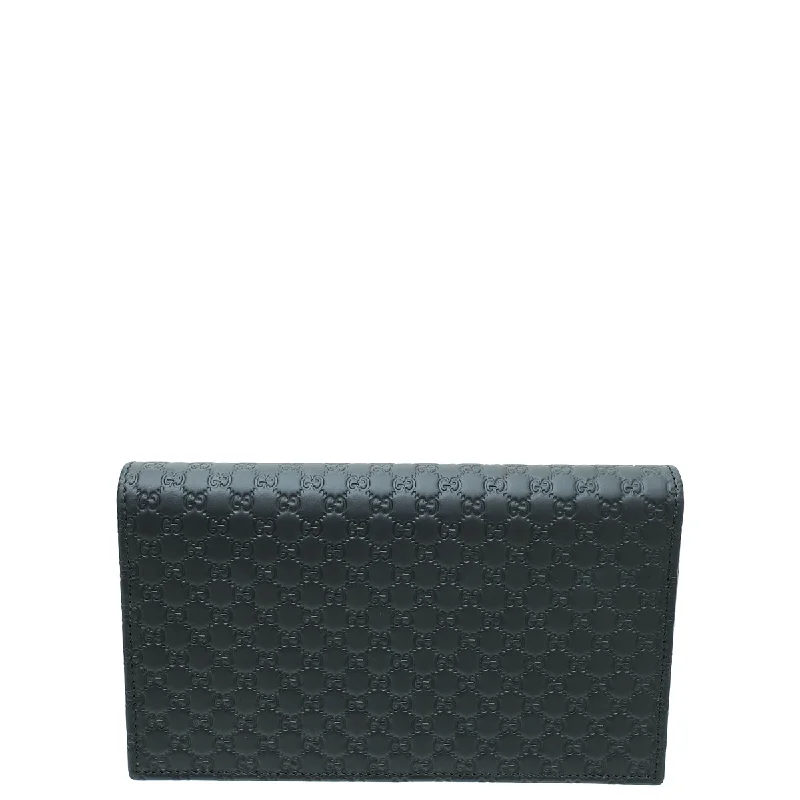 Women Gucci bags with a magnetic snap closure for easy accessGucci Black GG Microguccissima Strap Wallet