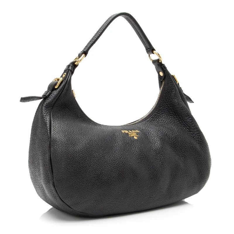 Prada Cahier bags featuring the signature triangular logo plaquePrada Vitello Daino Hobo 23377