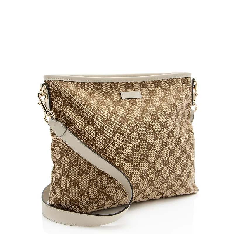 Women Gucci Sylvie bags with a monogram - embossed leatherGucci GG Canvas Classic Flat Medium Messenger (DQstbK)