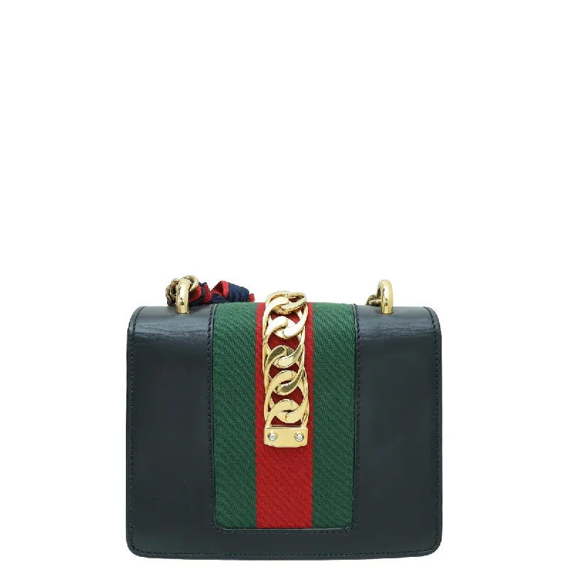 Women Gucci crossbody bags with a printed floral patternGucci Black Sylvie Mini Chain Shoulder Bag