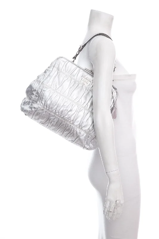 Prada Cleo bags with a detachable coin purse for added functionalityPrada Silver Leather Top Handle Handbag