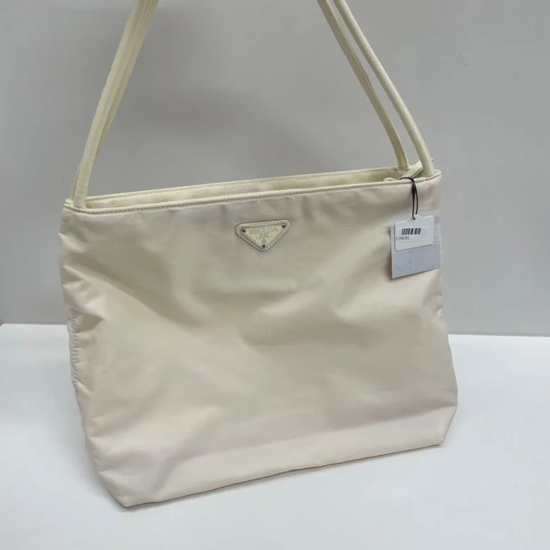 Prada handbags with a perforated leather detail for a unique and breathable designPrada Nylon Creamy White Tessuto City Tote Bag