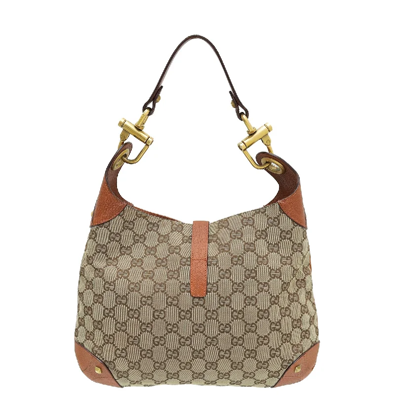 Ladies Gucci shoulder bags with a tassel decorationGucci Bicolor GG Piston Lock Jackie O Hobo Bag