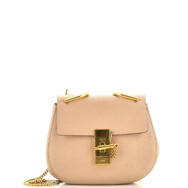 Prada Cleo bags with a detachable coin purse for added functionalityDrew Crossbody Bag Embossed Leather Mini