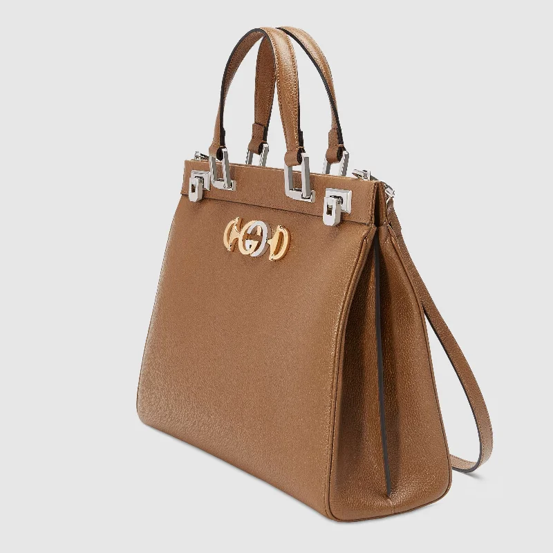 Gucci Marmont bags for women with a contrast - colored interiorGucci Zumi Handbag Women's Beige MEDIUM Full Grain Calf-Skin Leather Shoulder Bag (GG2054-B)