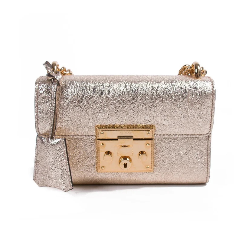 Women Gucci bags with interlocking G hardware for a classic lookGucci Metallic Padlock Shoulder Bag