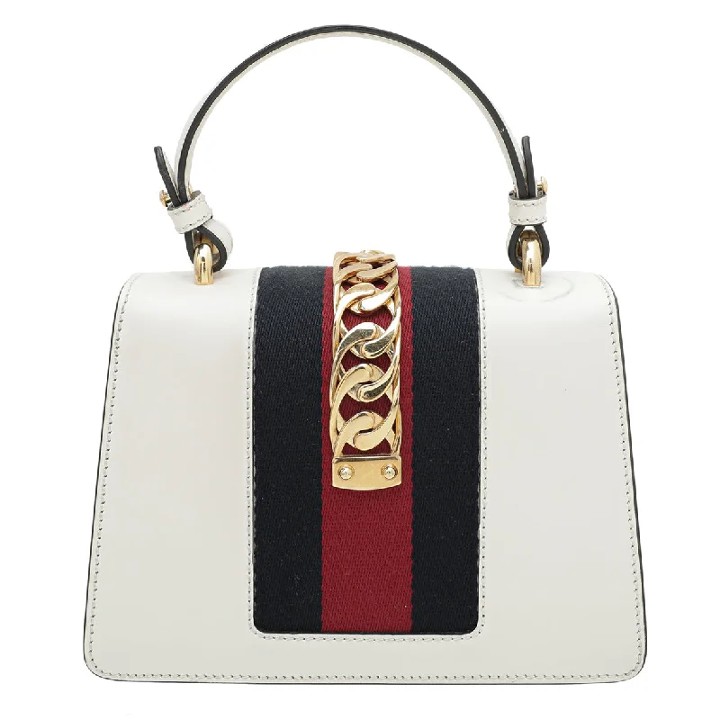 Gucci Marmont bags for women with quilted leather exteriorsGucci White Sylvie Floral Embroidered Mini Bag