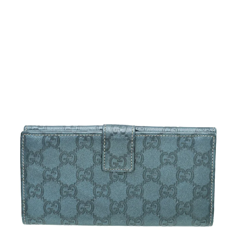 Women Gucci bags with a front - flap pocket for quick - access itemsGucci Metallic Slate Blue Guccissima Metal Bar Continental Wallet